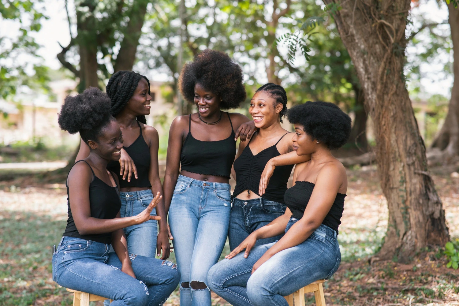 Women enjoying African-inspired beauty products
